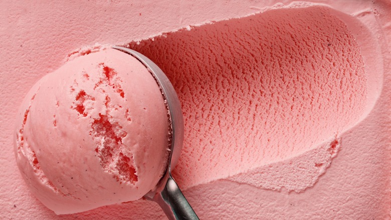 scooping pink ice cream