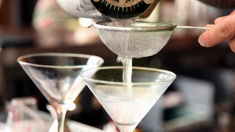 Martini strained into glass