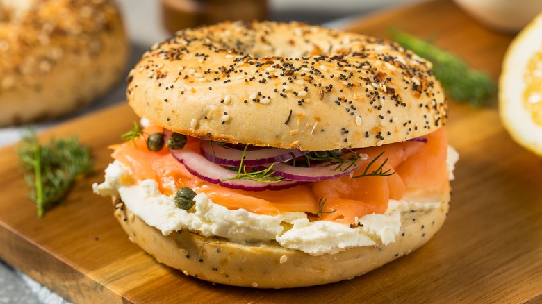 Seasoned bagel with lox and cream cheese