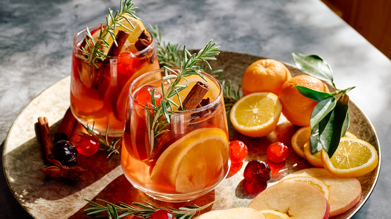 sangria displayed with an array of spices and fruits
