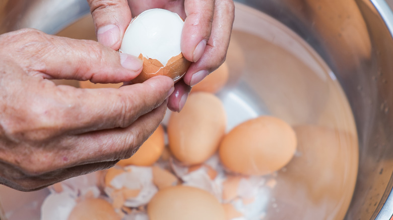 hard-boiled eggs in bowl of water