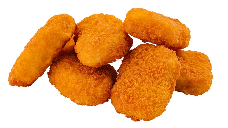 Close up of breaded chicken nuggets