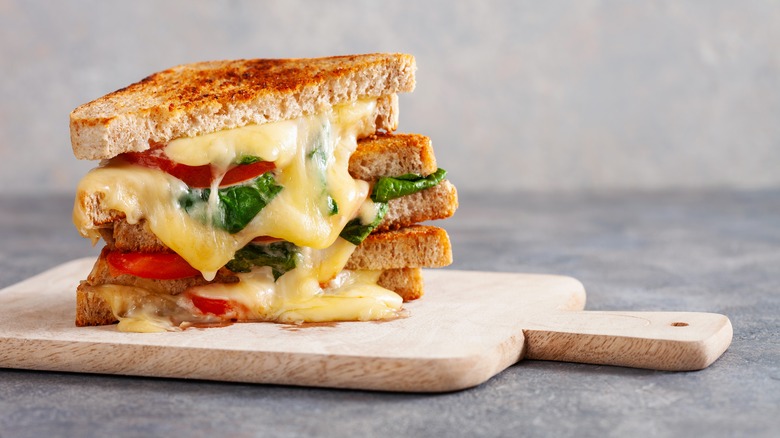 Grilled cheese with tomato and basil