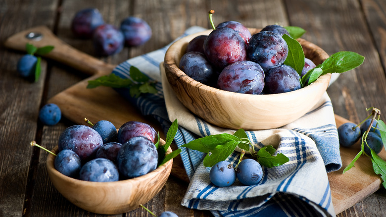 plums in bowls