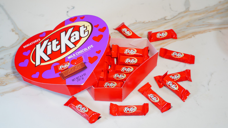 An open heart-shaped box of Kit Kats