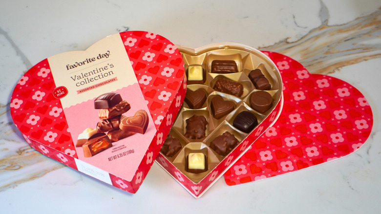 An open heart-shaped box of Favorite Day chocolates