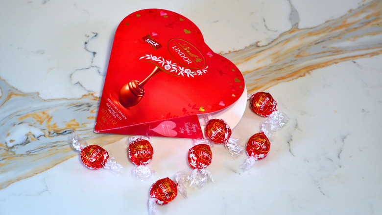 A closed heart-shaped Lindt Lindor