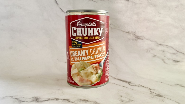 Campbell's Chunky Creamy Chicken & Dumplings soup can on counter