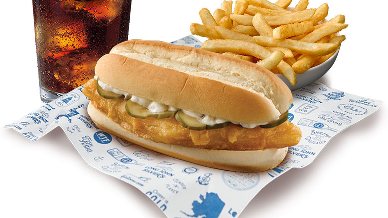 Long John Silver fish sandwich with fries and cola