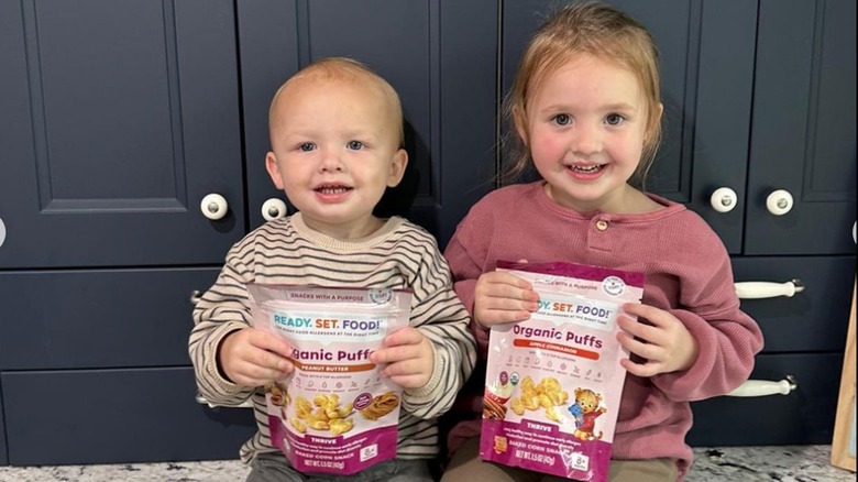 toddlers enjoying RSF organic puffs