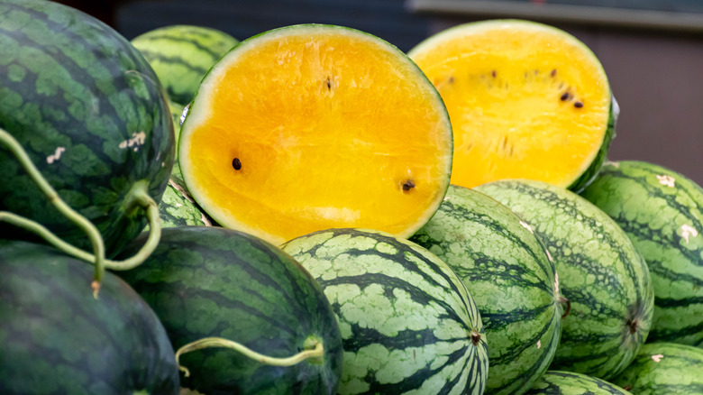 A halved yellow watermelon