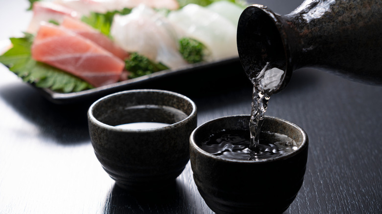 Sake rice wine in cups 