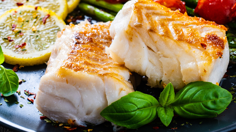 fish fillets with baked lemon slices