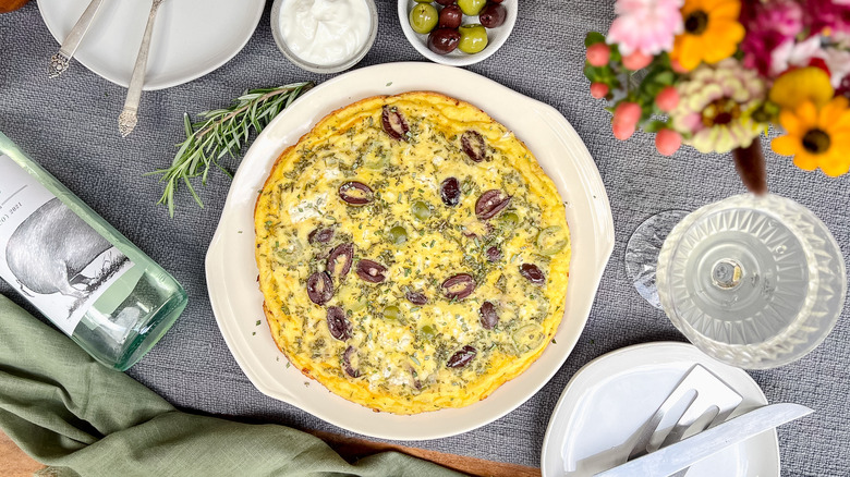 rosemary olive frittata on table