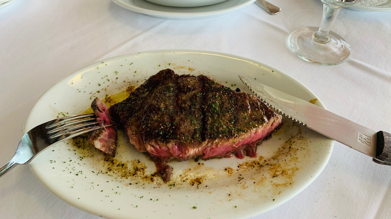 a rare steak at Ruth's Chris