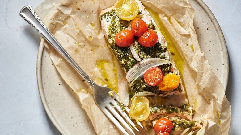 salmon on a plate with fork