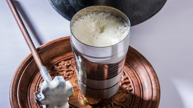 Indian salted lassi in steel glass