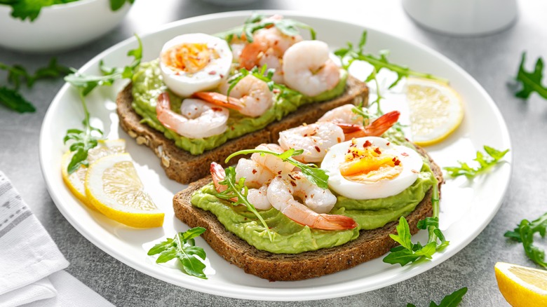 Avocado toast with shrimp and hard boiled egg