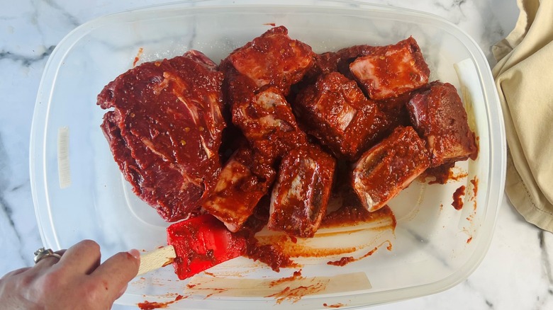 marinated beef in container