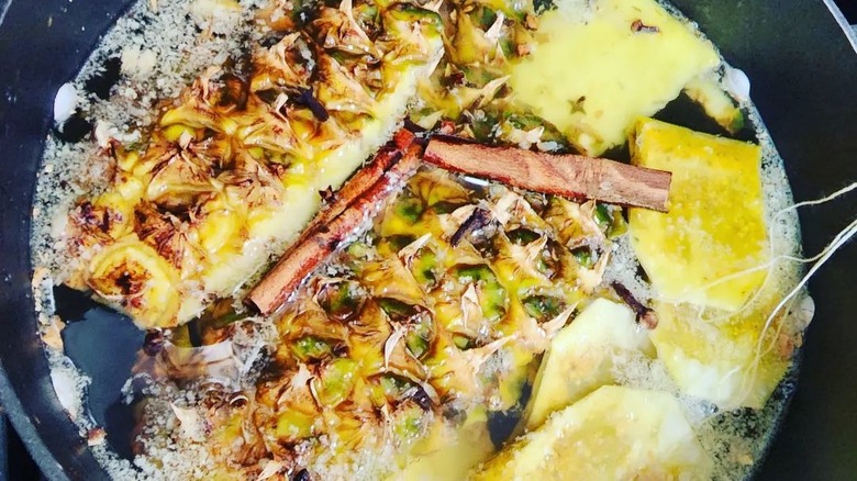pineapple tea boiling with spices