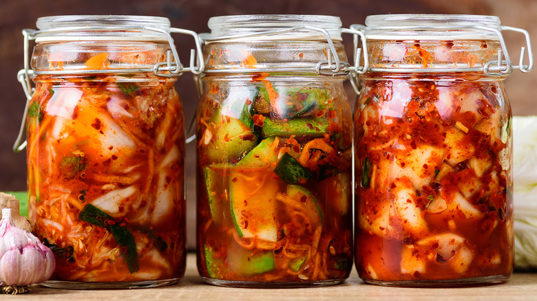 Kimchi vegetables in Mason jars