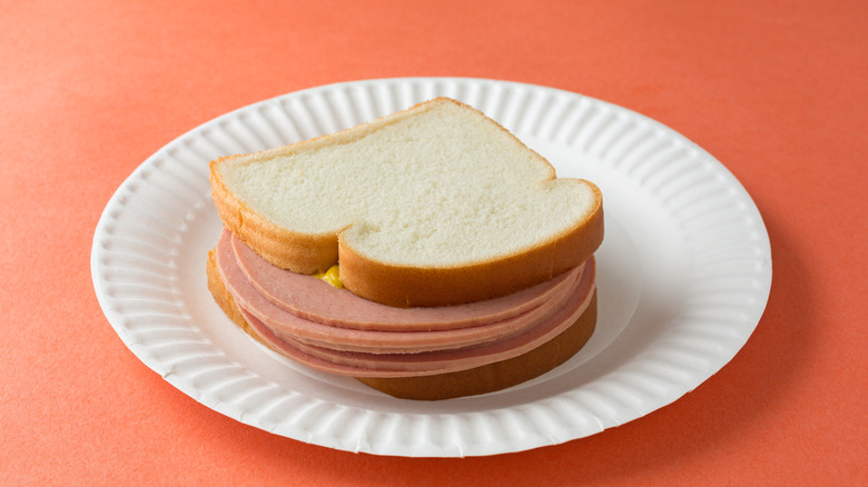 Bologna sandwich on paper plate