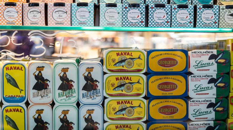 various brands of canned sardines on display