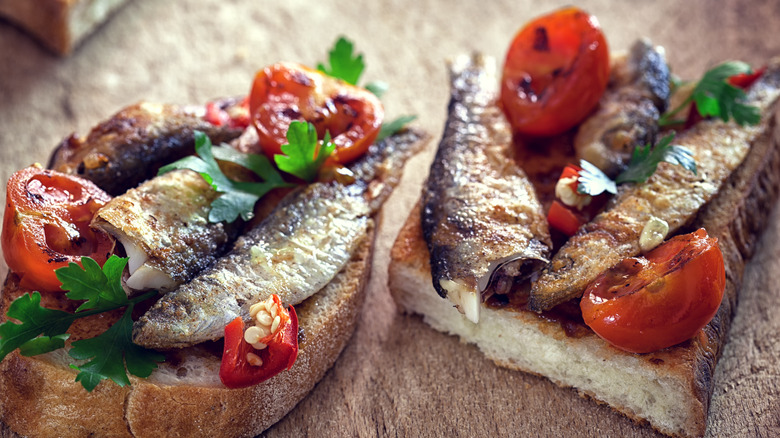 sardines and tomatoes with peppers over toast