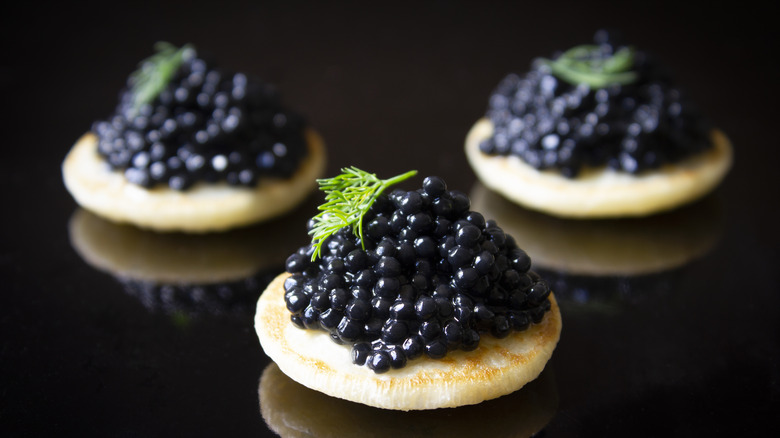 black caviar blini with dill