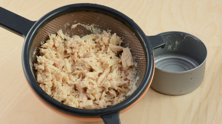 Rinsed canned tuna in strainer