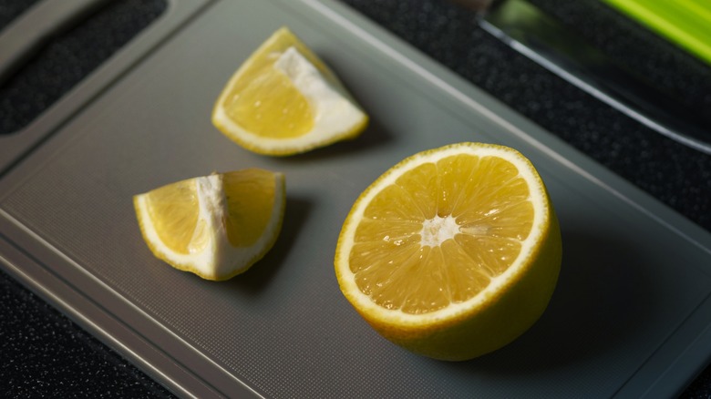 Sliced lemon on a cutting board