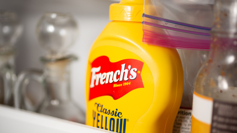 French's mustard in open fridge