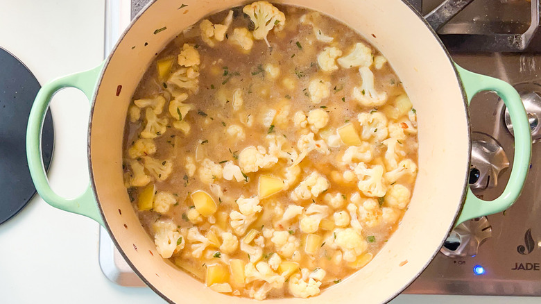 cauliflower in pot with liquid