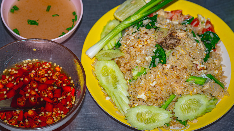 Thai vegetable fried rice with bowl of prik nam pla on the side