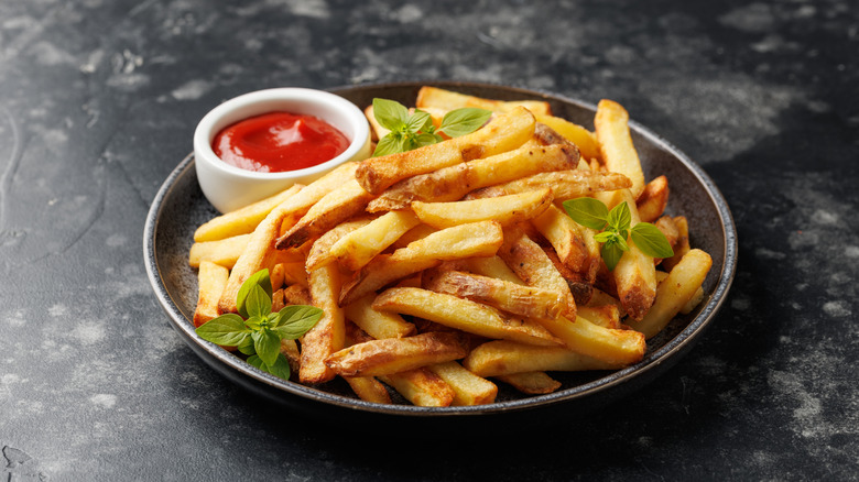 Homemade french fries with ketchup, homemade roasted in the air fryer.