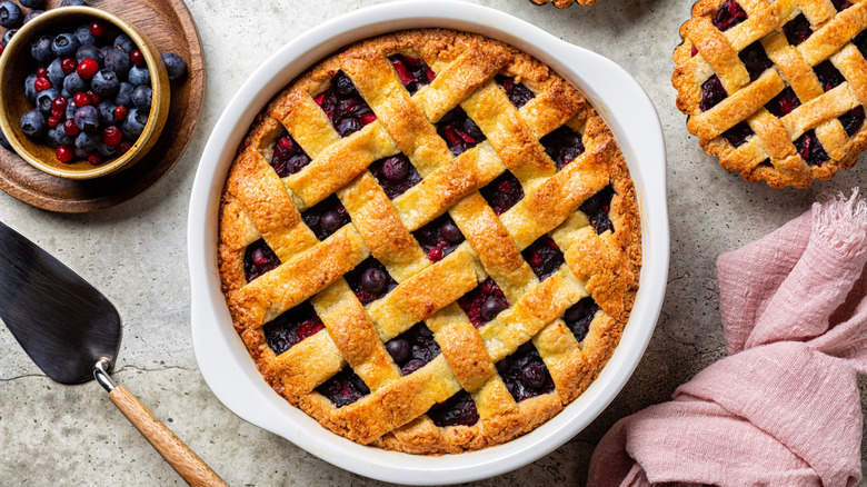 A fruit pie has a lattice crust.