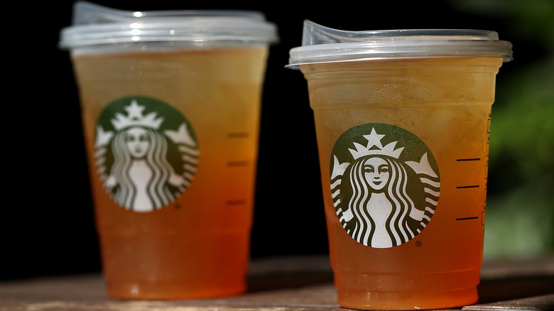 Starbucks iced tea in two cups