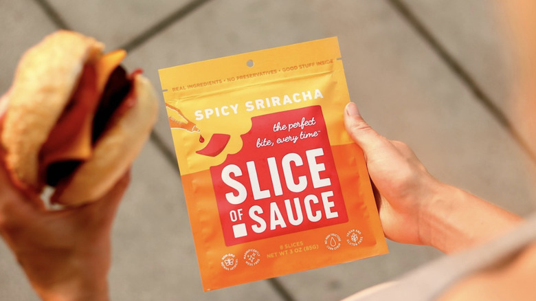 Slice of Sauce Sriracha packet and burger