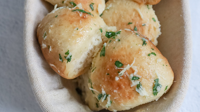 herb and cheese-covered rolls