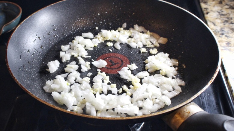 onion and garlic in skillet