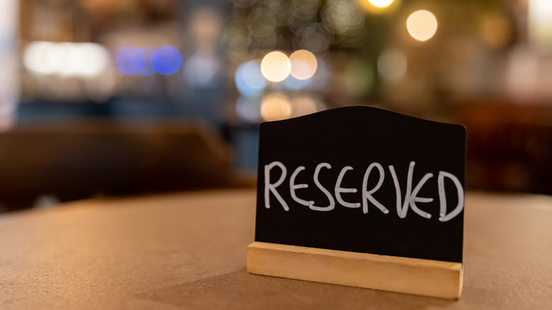 reserved sign in bar