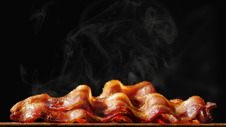 steaming hot curly bacon