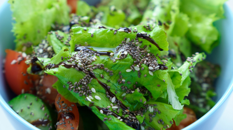 Green salad topped with chia seeds