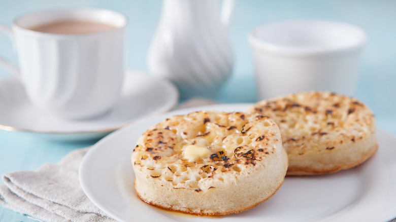 Two toasted crumpets with butter