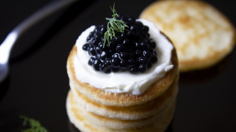Caviar on top of blinis