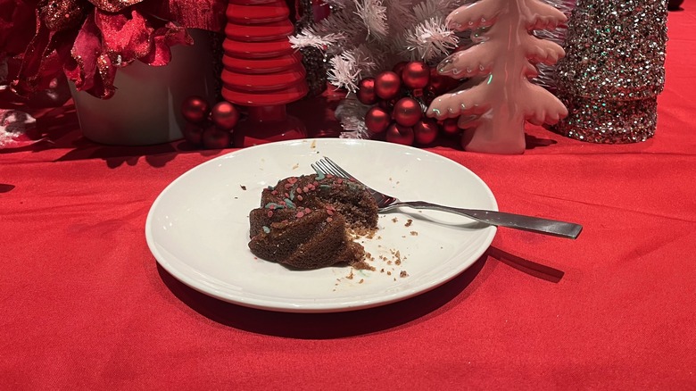 Dark toffee mini Bundt cake on a white plate