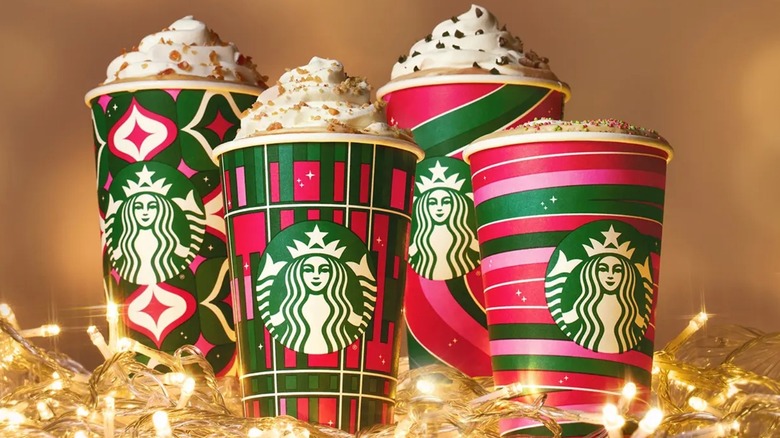 https://www.foodrepublic.com/img/gallery/starbucks-new-holiday-cups-stick-with-its-signature-red-and-green-theme/intro-1698857590.jpg