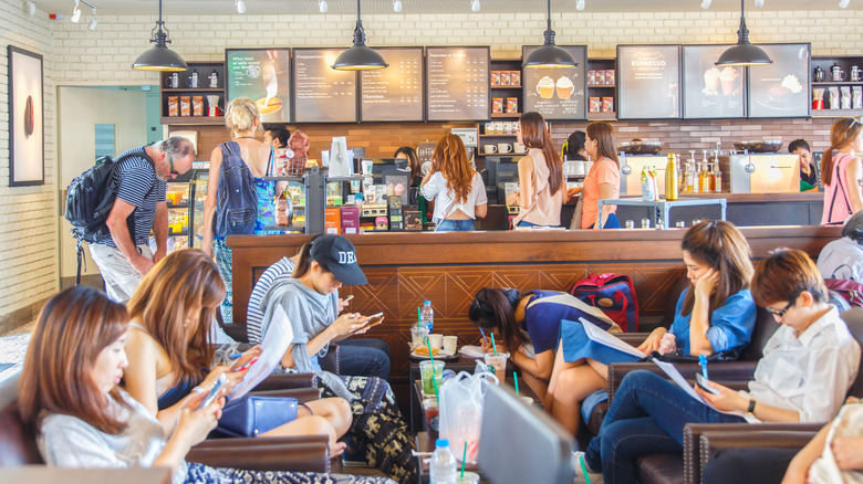 People gathered inside a Starbucks shop