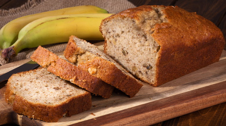 banana nut bread sliced on cutting board