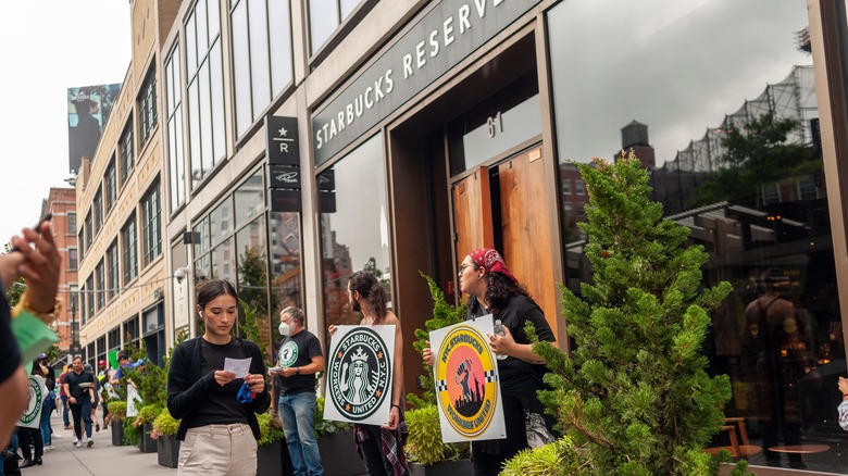 People protesting outside of Starbucks